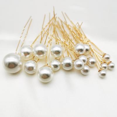 China Trendy Elegant Romantic Wedding Hair Pins For Brides Beads Wedding Bride Hair Accessories for sale