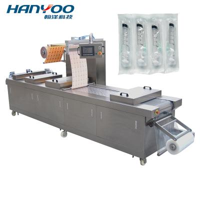 China DPS-520 Flexible Packaging Automatic Clamp Thermoforming Vacuum Packing Machine For Medicine à venda