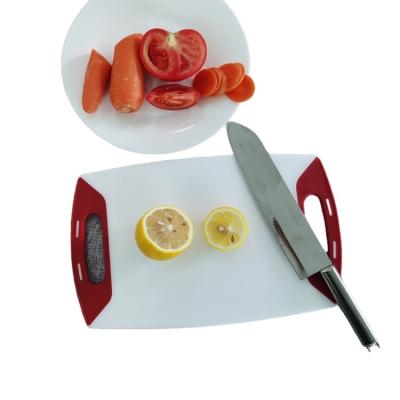 China 2021 Hot Selling Sustainable Cutting Board Portable Thin Plastic Cutting Board With Handles for sale