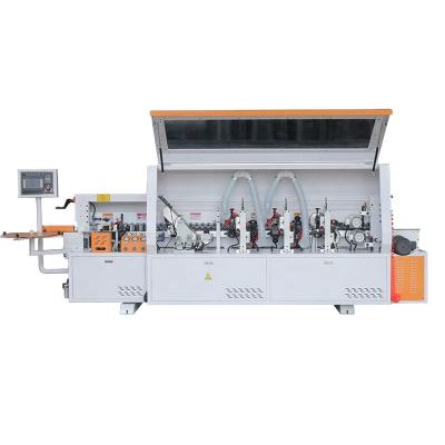 China Woodworking Factory Xiaojidong Dark Edging Machine PVC Full Automatic Wood Curve Edge Edging Machine for sale