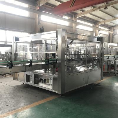 China Food Glue Automatic Cold Wet Rotary Bottle Labeling Machine For Plastic/Galss/Can Bottle for sale