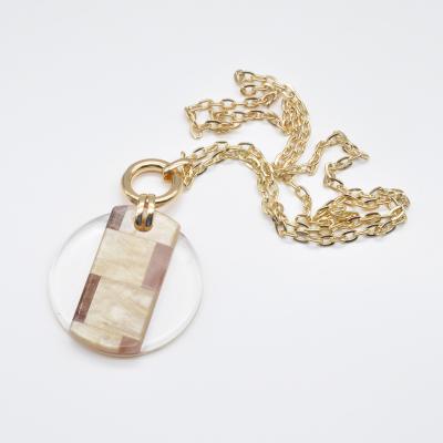 China Gold Plated / Filled Acrylic Resin Neck Jewelry 2020 2021 Elegant For Women Trendy Golden Pendant Necklace for sale