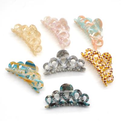 China Custom Girls Hair Decoration Hollow Craved Large Design Cellulose Acetate Acrylic Hair Claw Clips for sale