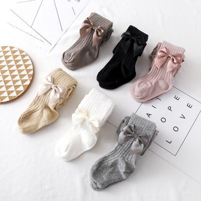 China Anti-wrinkle nice boutique clothes fall pants baby solid knit leggings with bow for sale