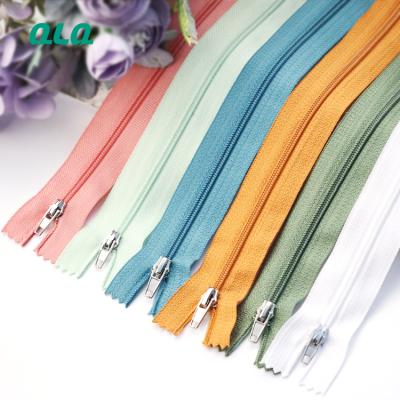 China Auto Lock Factory ODM Nylon Narrow End Zipper For Garment Or Bags for sale