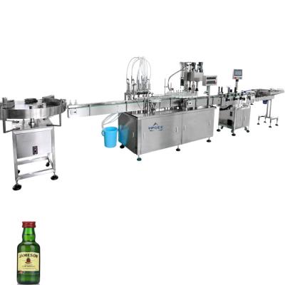 China 50ml plastic liquor bottles filling machine line with sticker labeling machine for sale