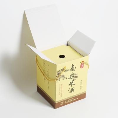 China Lightweight Custom Logo White Paper Board Tuck End Packing Box for Light Yellow Liquor for sale