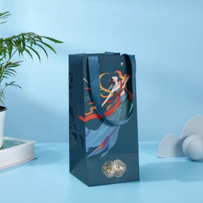 China Custom Logo Luxury Paper Takeaway Bag With Handle For Gifting Tea Clothes Perfume for sale