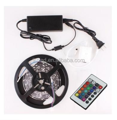 China Brand new and best 3528 garden flexible waterproof led strip light 5M RGB 300 +24 keys IR remote controller+power adapter for sale