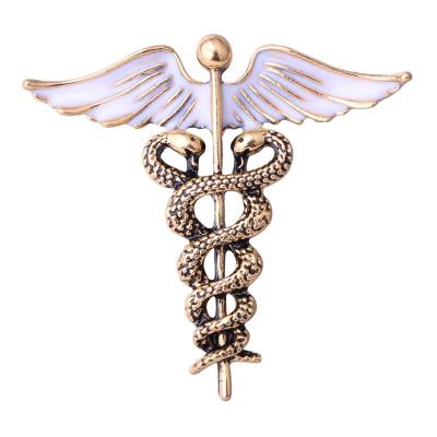 China Angel Wings Brooch Snake Shape Brooches Double Horse Taped New Women Dress Decoration Brooches Pins Nurse Medical Doctor Brooch For Women Men for sale