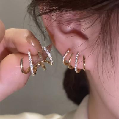 China Ailiany 2022 TRENDY Fashion 4 Layers Claw Setting Silver Zircon CZ Ear Cuff 925 Needle Ear Clip Earrings For Women Jewelry for sale