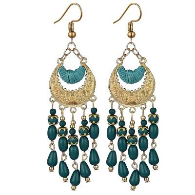 China Vintage Romantic Bohemian Ethnic Tassel Long Earrings Vintage Style Hot Selling Europe and America Cut Out Earrings Wholesale for sale