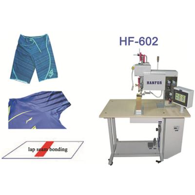 China Seam Tapping High Quality Multifunctional Long Arm Seam Tapping With T Shirt Sticky Lap Seam Hemming Roller Machine for sale