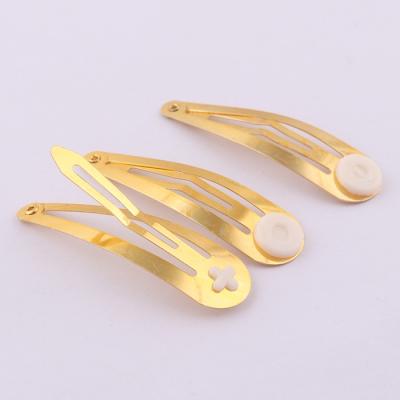 China Accessories factory wholesale 5cm gold color metal snap hair clip with protective plastic baby hair clip accessories for sale