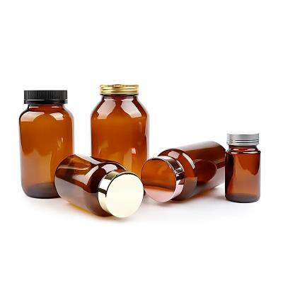 China Medicine Wholesale Amber round 75ml-500ml recycled wide mouth glass capsule bottle with plastic screw cap for lab medicine pill for sale