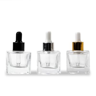 China Cosmetic 30ml clear square essential oil glass perfume bottle with dropper for sale