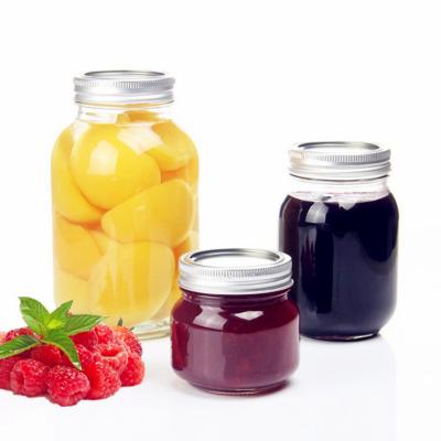 China Wholesale Freshness Preservation 100ml-750ml 8oz Round Empty Wide Mouth Clear Storage Glass Canning Jars With Metal Lid Bulk for sale