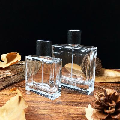 China Perfume Square Crimp Seal Spray Glass Perfume Bottle For Cosmetic Oil Fragrance Packaging for sale