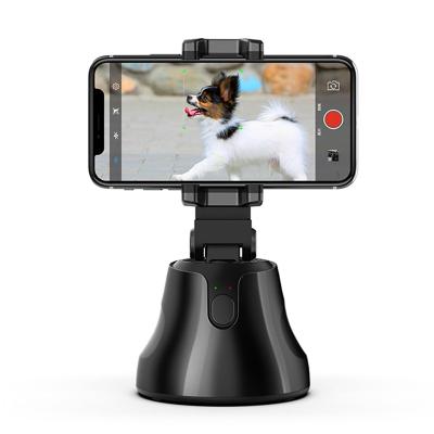 China Custom Logo 360 Rotation Auto Smart Tracking Face Object Smart Selfie Tracking Stick Shooting Camera Phone Holder for sale