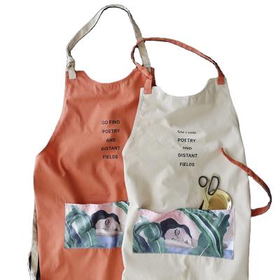 China Oil Proof Cotton Kitchen Apron For Cooking For Men And Women With Artwork On Pocket for sale