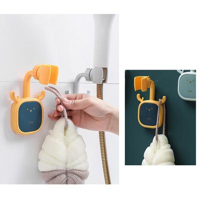 China Waterproof And Endurable Bathroom Accessories Cute Shower Bracket Antlers Form Shower Head Holder for sale