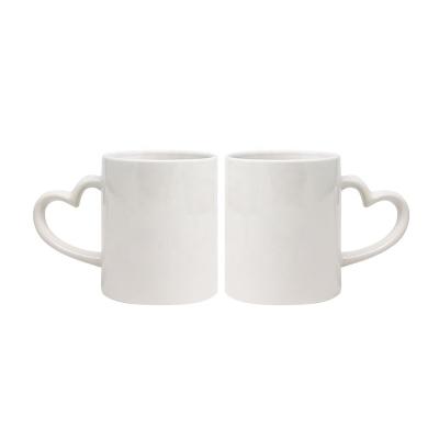 China Supplier Wholesale Disposable Stoneware Mug Sublimation Mug Sublimation Heart Handle Ceramic White Mug for sale