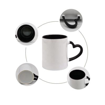 China Viable Promotional Advertising Coffee Sublimation Mug Heart Handle Ceramic Coated Mug for sale