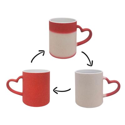 China Custom Viable Mugs 11oz Change Color Mug Sublimation Ceramic Color Changing Mug With Heart Handle for sale