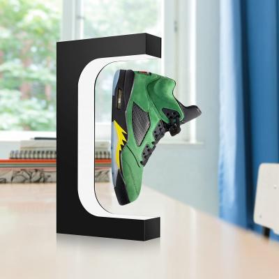 China Fashionable A1 Rotating RGB Led Levitation Display Shoe Levitation Acrylic Magnetic Floating Rack Stand In Multiple Shapes for sale