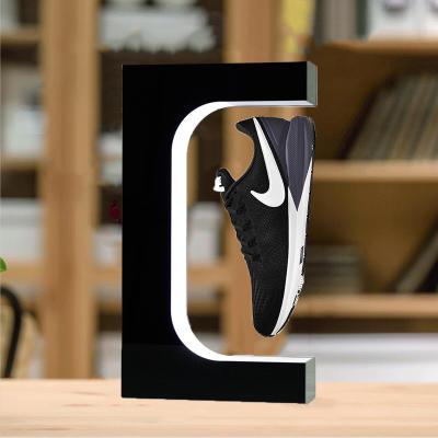 China Showcase Rotating Shoe Levitating Rack Shoe Display Stand Magnetic Levitating Floating Shoe Display Products for sale