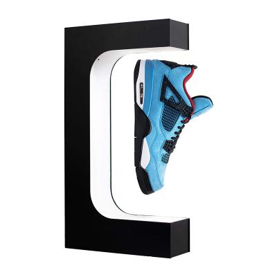 China Fashionable Hot Selling LED Magnetic Levitation Custom Rotating Acrylic Floating Shoes Display Stand for sale