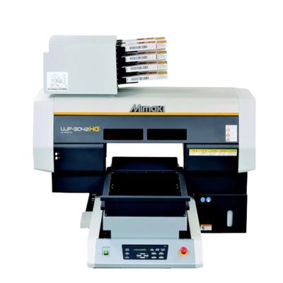 China Durable Hotels Using Low Price UJF-A3HG Flatbed UV Printer UV Inkjet Printer for sale