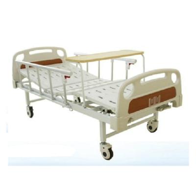 China Metal Medical Bed With Dining Table Two Crank Manual Bed for sale