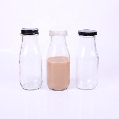 China Beverage Glass Bottle Transparent Water Bottle Glass Milk Water Bottle 300ml With Tinplate Lid for sale