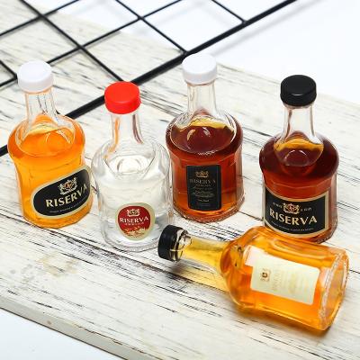 China 50ml Mini Glass Liquor Bottle With Safe Plastic Lid On Bachelor Night Party for sale