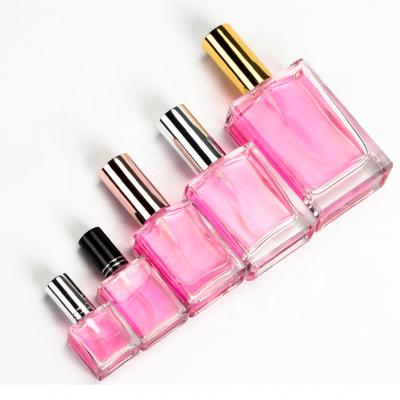 China Free Samples 10ml 15ml 30ml 50ml 100ml Luxury Personal Care Oblate Shape Mist Spray Glass Perfume Bottle With Silver Cap for sale