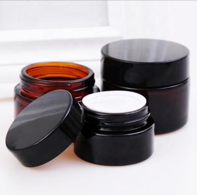 China Hot Sale Personal Care Cosmetic Container Lotions Bottles 50g Amber Cream Glass Jar With Plastic Cap for sale