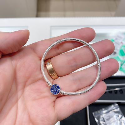 China BOHEMIA Sterling Silver s925 Buckle Snake Bone Chain Bracelet Glitter Blue Button Shaped Female Gift for sale