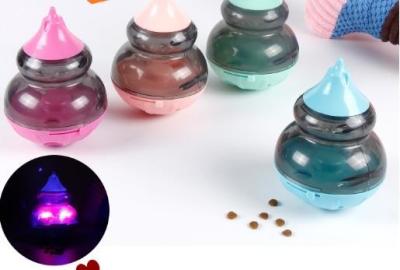 China Jitter glow Interactive Tumbler Dog Treat Ball, Dog Leaky Food Dispensing Toy Puzzle Ball,The interactive cat feeder for sale