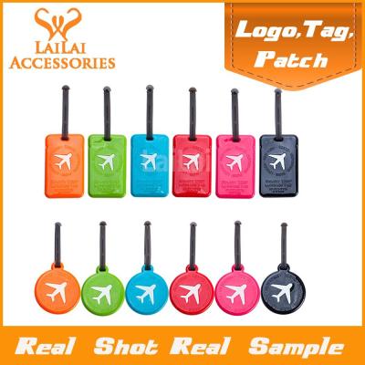 China Durable Wholesale Colorful Low Price Silicone Rubber Label Custom Silicone Travel Luggage Tag for sale