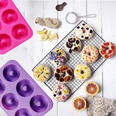 China 100% Non-Stick Silicone BPA Free Microwave Sustainable Silicone Donuts Baking Pan Mold for sale