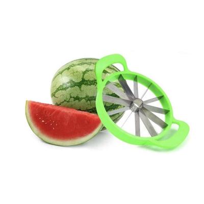 China Viable Silicone Handle Watermelon Slicer Watermelon Cutter Peeler for sale