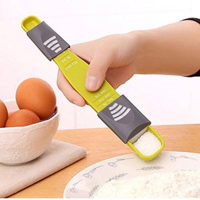 China Double End Eight Stalls Home Practical Green Adjustable Scale ABS Dosing Measuring Spoon Kitchen Tools for sale