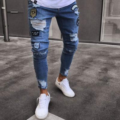 China Destroyed Badge Distressed Anti Pilling New Style Italy Men Pants Art Patches Skinny Biker White Jeans Slim Pants Mens Jeans for sale