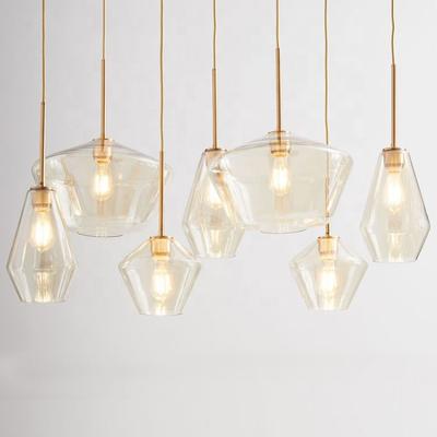 China Living Room Modern Style Decorating Champagne Clear Glass Hanging Pendant Lamp for sale