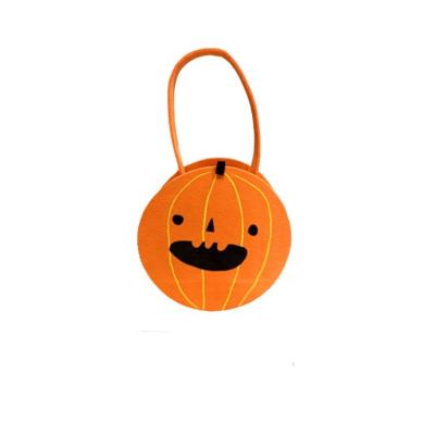 China Others High Quality Mini Hand Bags Halloween Candy Bags Pumpkin Ghost Candy Trick Gold Treat Felt Bags With Handle for sale