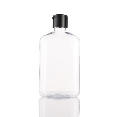 China Big Capacity Cosmetic PET 500ml Round Plastic Bottle With Pump for sale