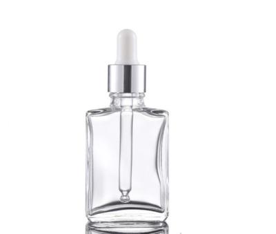 China 30ml 50ml 100ml Cosmetic Flat Square Clear Black White Black Glass Dropper Bottle With Dropper for sale