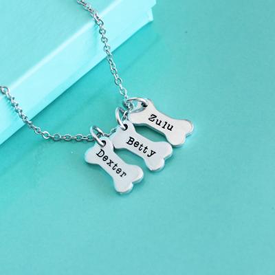 China CLASSIC Custom Pet Name Personalize Jewelry Memorial Dog Bone With Puppy Paw Pendant Necklace For Women for sale