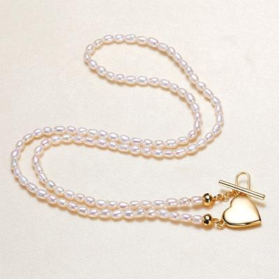 China CLASSIC Fashion Mini Pearl Necklace Pendant 2-4mm Freshwater Rice Pearl Necklace With Heart Pendant for sale